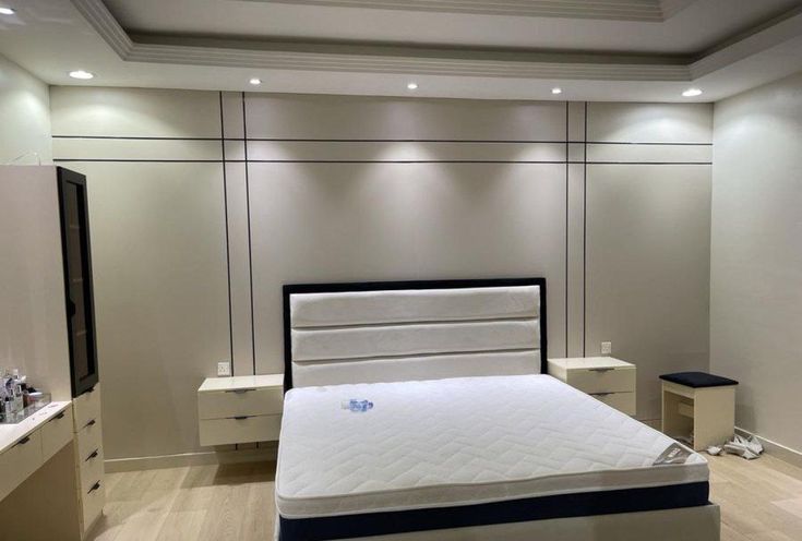 Réalisation réelle : mur panneauté bois dans une chambre — بديل الشيبورد NovaBard Tanger