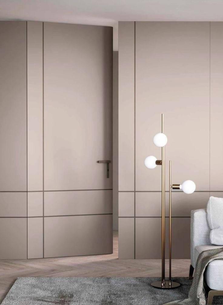 Portes invisibles intégrées aux panneaux muraux beige — بديل الشيبورد NovaBard Tanger