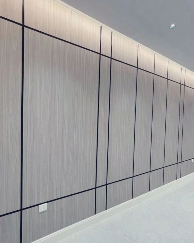 Détail de panneaux muraux avec joints creux noirs — بديل الشيبورد NovaBard Tanger